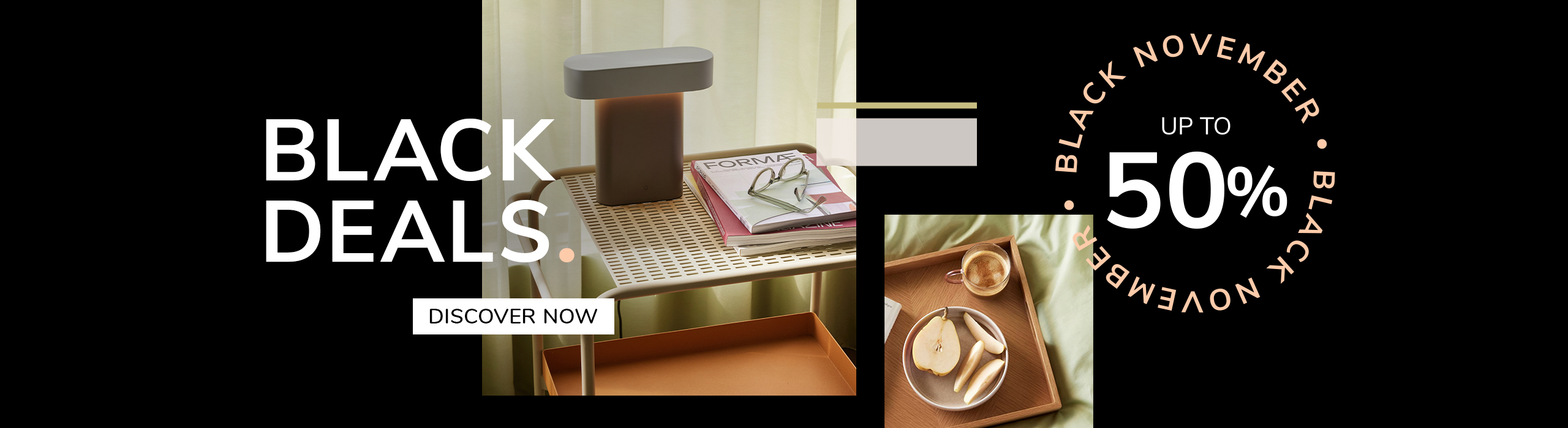 Elegant designer table lamp on natural stone base with gold stem and white shade, promoting Black November sale – up to 40% off with text ‘First Black Deals’ and ‘Discover More’ button.